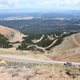 A look back at the road below from above the treeline.